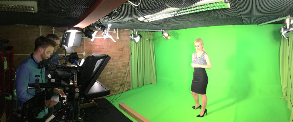 Hard at work in our Green Screen Studio.